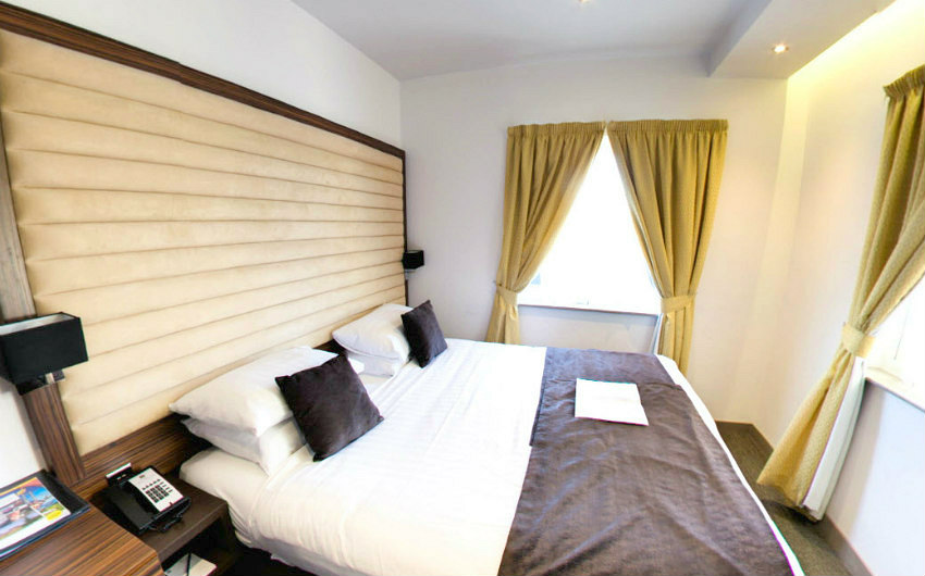 Executive king rooms have a large double bed at Maitrise Hotel London Maida Vale