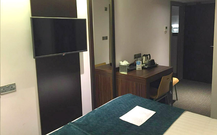 A typical double room with flatscreen TV at Maitrise Hotel London Maida Vale