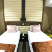 A comfortable twin room with WiFi and telephone at Maitrise Hotel London Maida Vale
